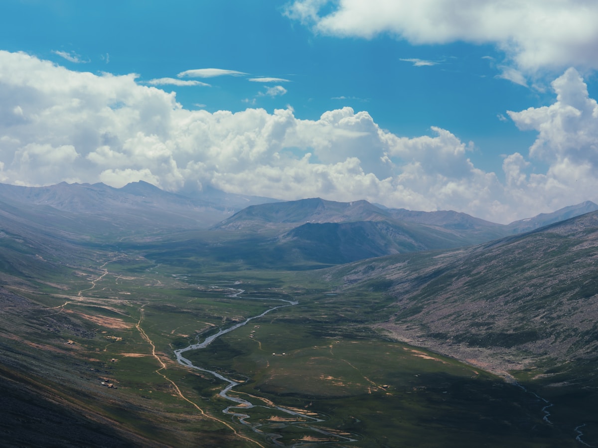 Mountains under moving clouds